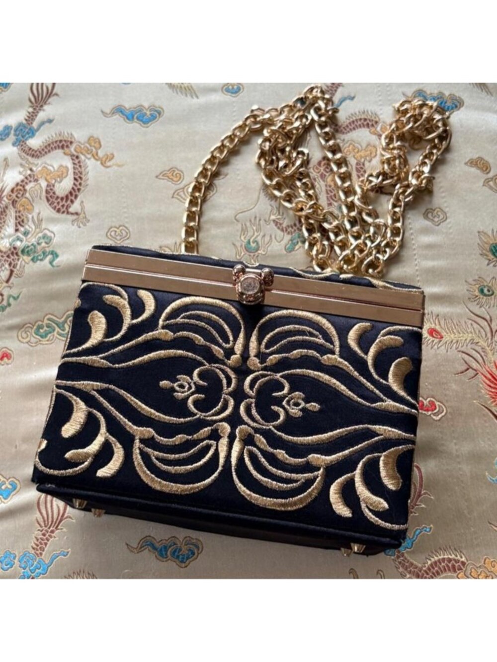 black and gold box purse with chain strap